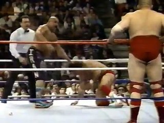 IRON SHEIK, NIKOLAI VOLKOV & BUTCH REED WORK OVER PAUL ROMA