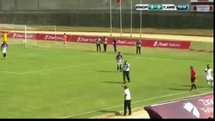 Security guard taIking on phone during ongoing TurkishCup game.