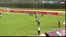 Security guard taIking on phone during ongoing TurkishCup game.
