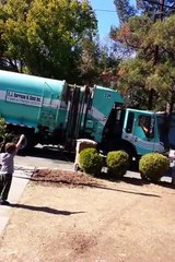 Garbage Man Brings Special Gift to Autistic Child