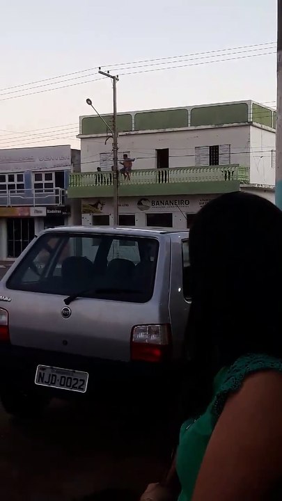 Drunk Man Falls off a Telephone Pole