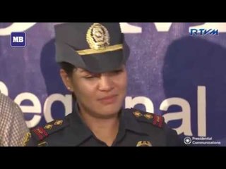 Police officer proposes marriage to President Duterte's aide after his speech