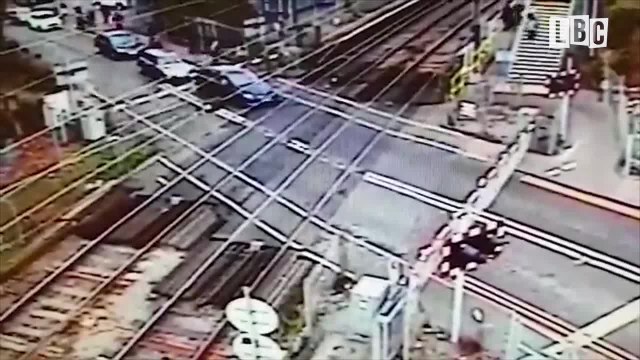 Learner Goes Past Level Crossing Barrier, Then Reverses Into Car Behind In A Panic