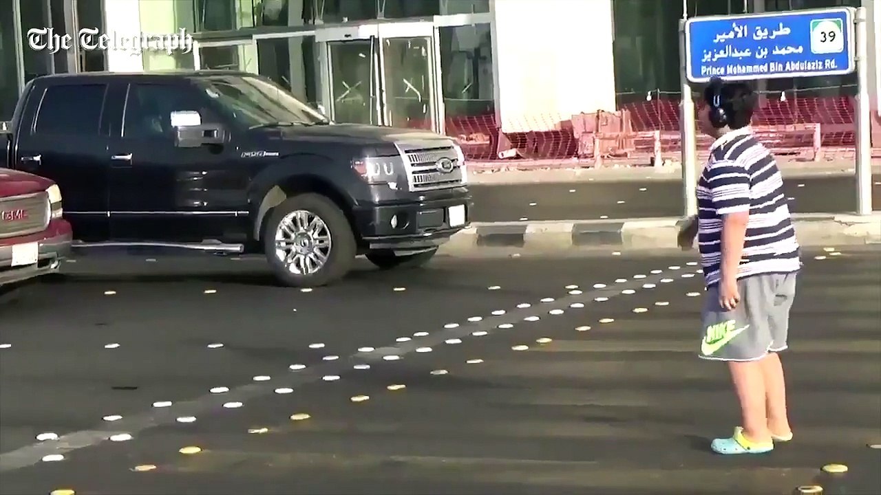 Fat Kid Dances The Macarena In Front Of Traffic In Saudi Arabia