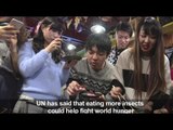 Japanese foodies enjoy an unusual Christmas meal: insects