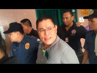 Smiling Purisima 'voluntarily surrenders'