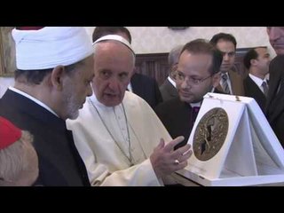 Pope and top imam embrace in historic meeting at Vatican