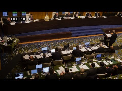 Protesters rally a day before South China Sea ruling