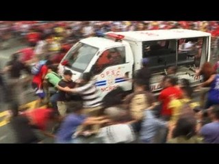 Police van runs over protesters at anti-US rally