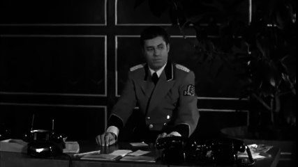 Funcionário de hotel atendendo telefones - Jerry Lewis