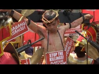 Demonstrators reenact Passion of Christ to protest drug war