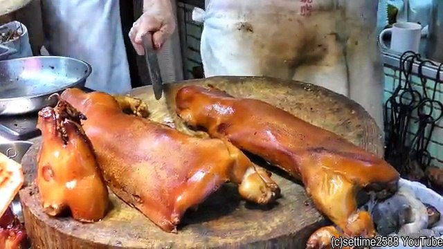 Hong Kong Street Food. Chopping Piglets, Ducks, Pigeons, Chickens in Sham Shui Po