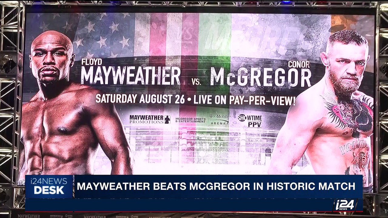 i24NEWS DESK | Mayweather beats McGregor in his...