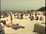 TG 14.08.13 Turisti sotto scorta alla spiaggia di Pane e Pomodoro