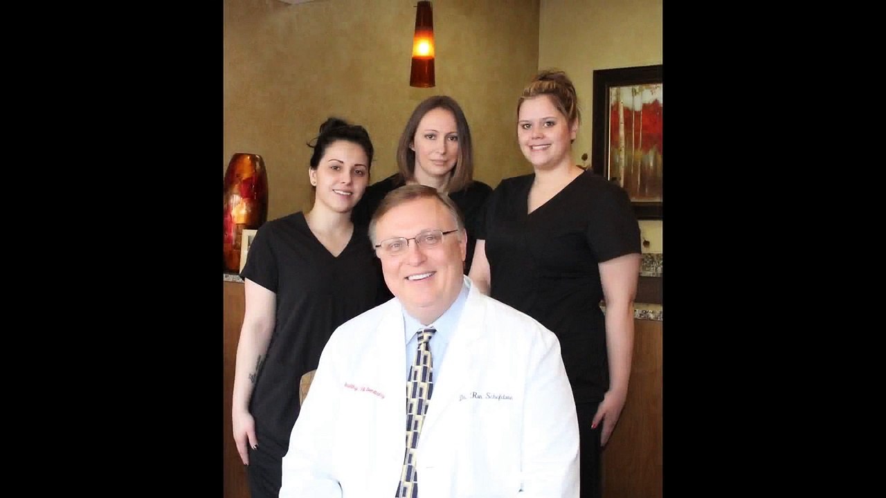 Dental Implants Lisle IL (630) 381-1414 | Dental Care of Lisle | Tooth Implants | Teeth Bleaching