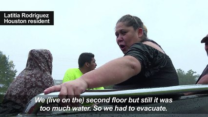 Rescue operations continue in Houston neighborhoods
