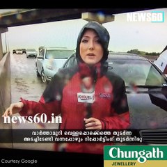 Journalist, rescuers save truck driver from flood waters