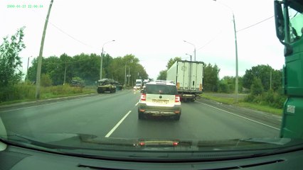 Armored Vehicle Hits Car in Intersection