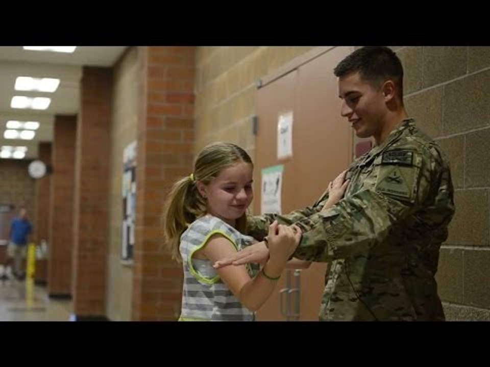 Soldier Surprises Younger Sister At School