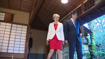 Theresa May joins Shinzo Abe for tea in Japan