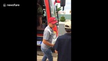 Angry driver tries to kick French tourists off bus in Vietnam
