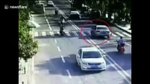 Terrifying moment little boy runs into road and is hit by car