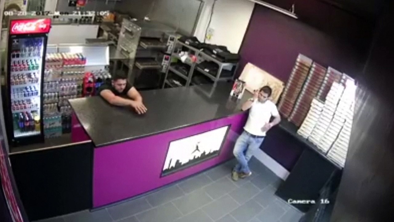 CCTV catches fireworks exploding in pizza parlour