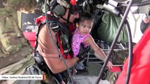 Watch Two Kids And Woman Being Rescued From Harvey Flood Waters