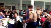 Marine brother surprises his little sister.