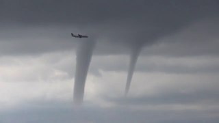 A passenger jet pilot was forced to fly around three tornadoes in a frightening descent in Russia
