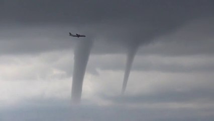 A passenger jet pilot was forced to fly around three tornadoes in a frightening descent in Russia