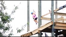 Alligator leaps out the water to try to bite woman on zipline