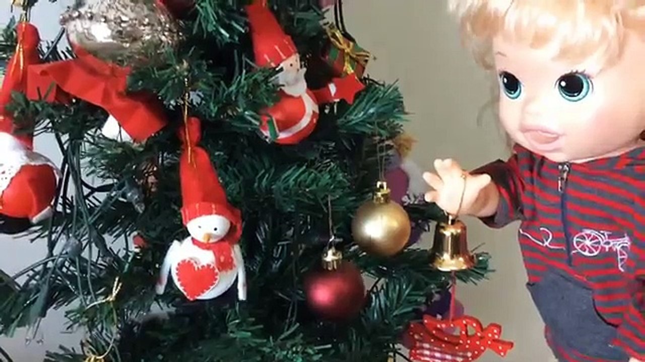 Vivant bébé cadeaux douverture de Noël
