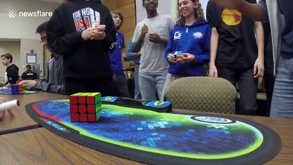 15-year-old smashes world record for solving Rubik's Cube