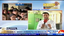 Recarga verde: usuarios del metro de Medellín en Colombia intercambian botellas por pasajes del sistema