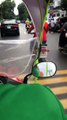 Tài xế GrabBike tạo dù che mưa, bật nhạc 'Em gái mưa' đãi khách