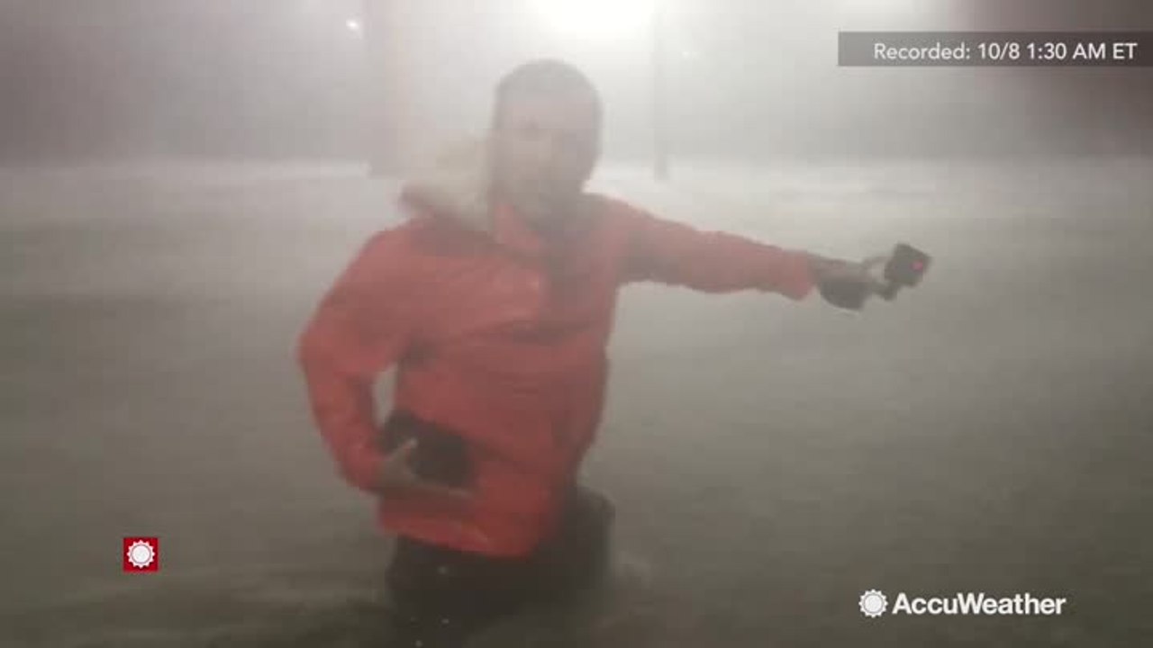 Intense footage: Reed Timmer in waist-deep wate...