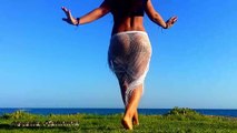 Natalia Kalinina dancing on the beach