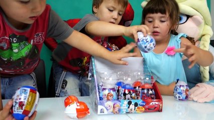 Kinder joy surprises eggs with kids Elsa and Spiderman