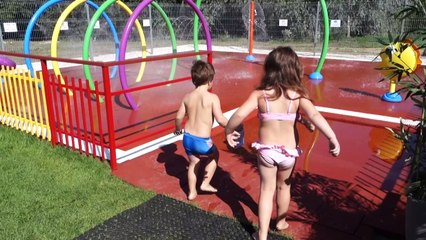 Baby girl and baby boys palying playground water playground Funny baby movie for kids children