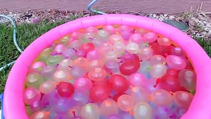 Joker Girl Water Balloon fight w/ Princess Rapunzel, Snow White, Jasmine