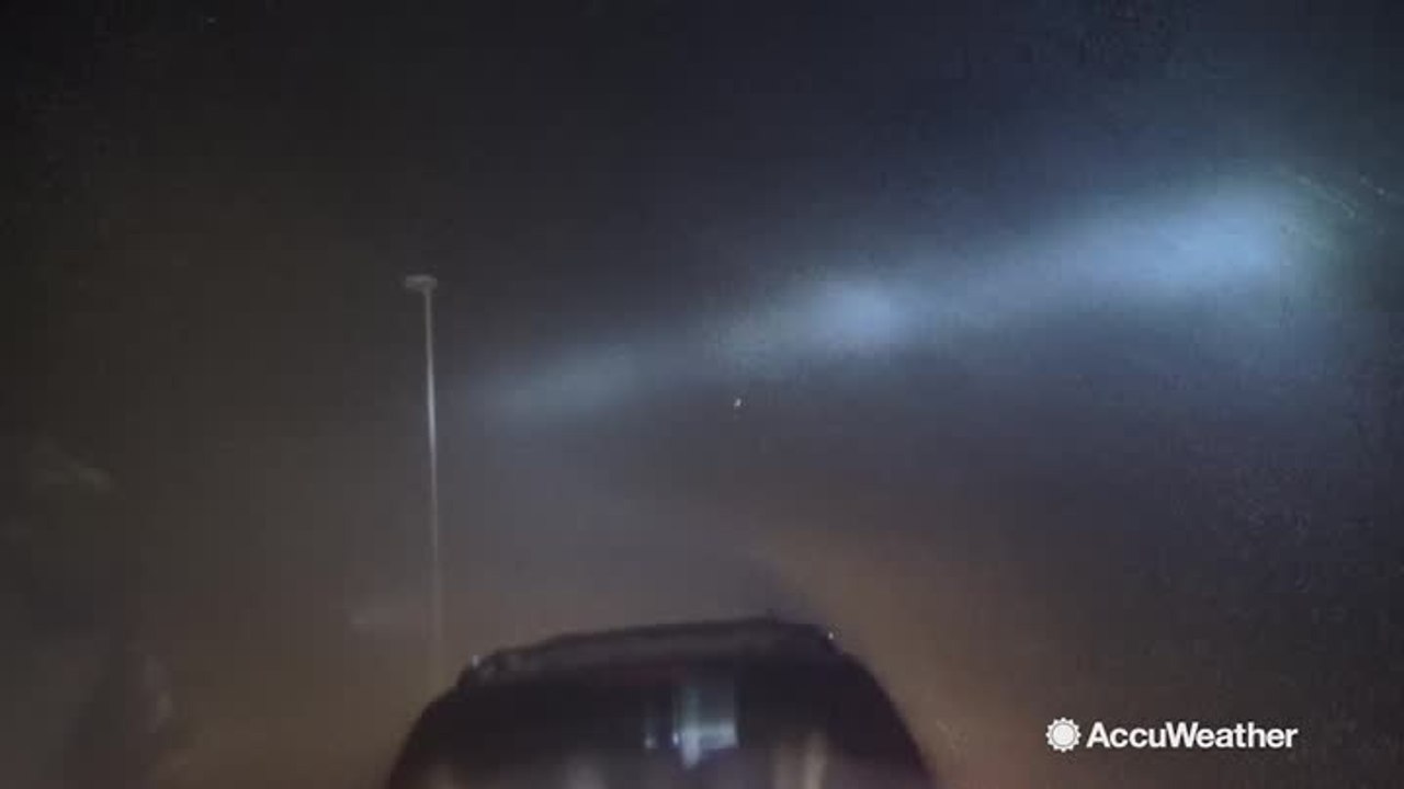 Reed Timmer records as Hurricane Harvey rocks cars back and forth, cuts off power to hotel