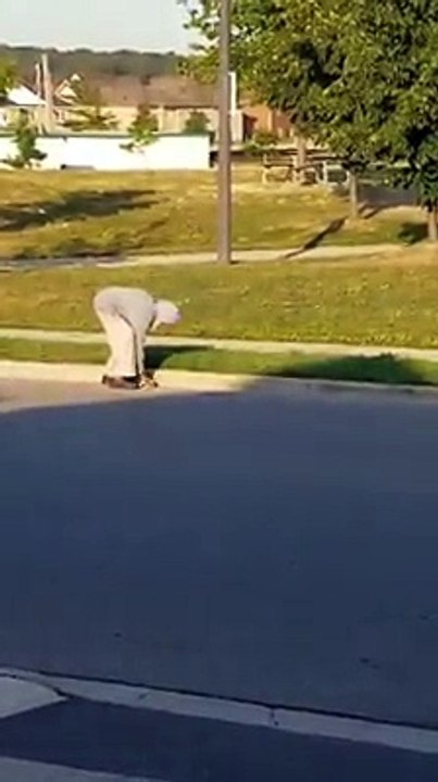 Elderly babaji cleaning the park and surrounding near pantomine