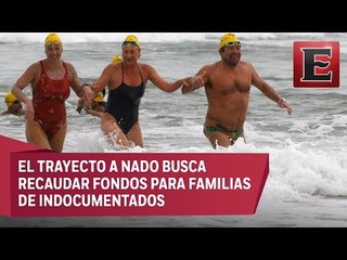 Atletas nadan de EU a México en apoyo a migrantes