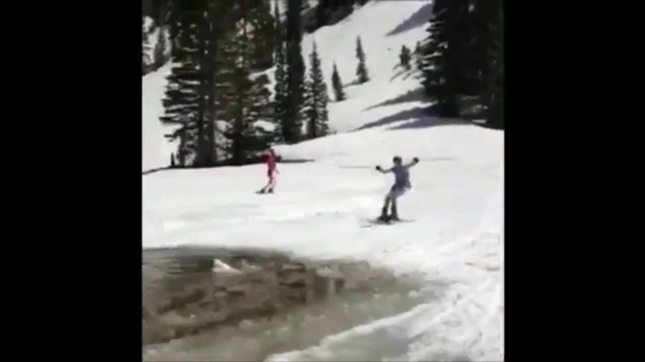 VideoIl réussi à franchir l'eau avec ses skis.... enfin presque..
