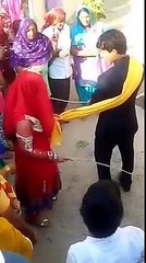 Bride beating groom