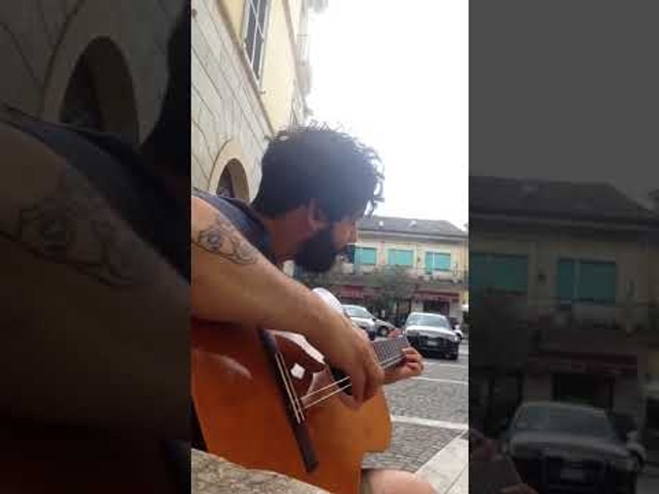 Man Stuck With Two Stringed Guitar Creates Original Composition