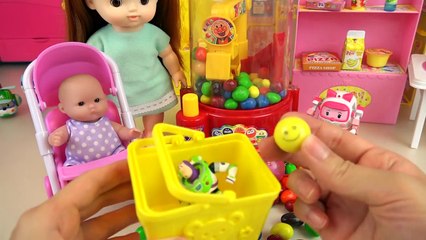 Candy dispenser and Mart Baby doll surprise eggs toys play