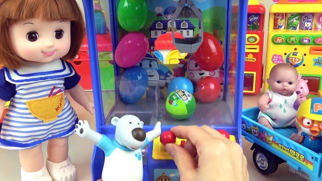 Poli surprise eggs crane machine and Baby doll, Kinder Joy toys