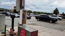 Cars line up at Florida petrol station before Hurricane Irma hits